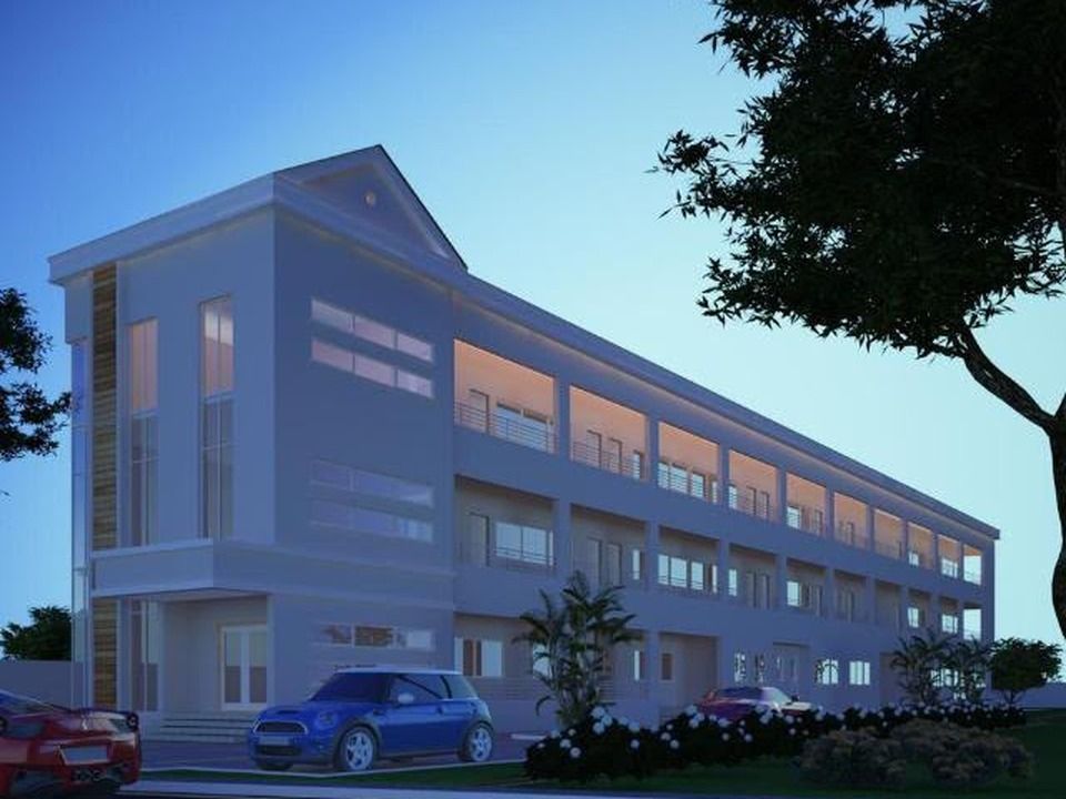 Architectural render of the Tender Hearts Schools building: a long three-storey block with balconies